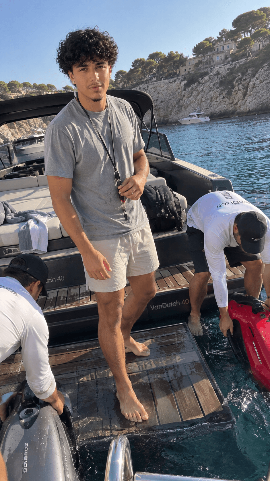 AI-generated morning Seabob preparation on a boat in a rocky Mediterranean cove